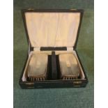 Pair of Charles Green engine turned brushes in fitted case, assay Birmingham 1965.