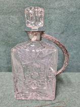 Cut glass rectangular claret jug with silver rim and fox tail handle with a Lawrence Watson & Co