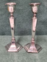 Pair of weighted silver candlesticks, hexagonal form standing 205mm tall by James Deakin & Son,