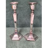 Pair of weighted silver candlesticks, hexagonal form standing 205mm tall by James Deakin & Son,