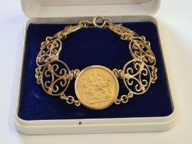 1908 gold full sovereign mounted in 9ct gold bracelet of 6 interlinked roundels. Total weight 25.