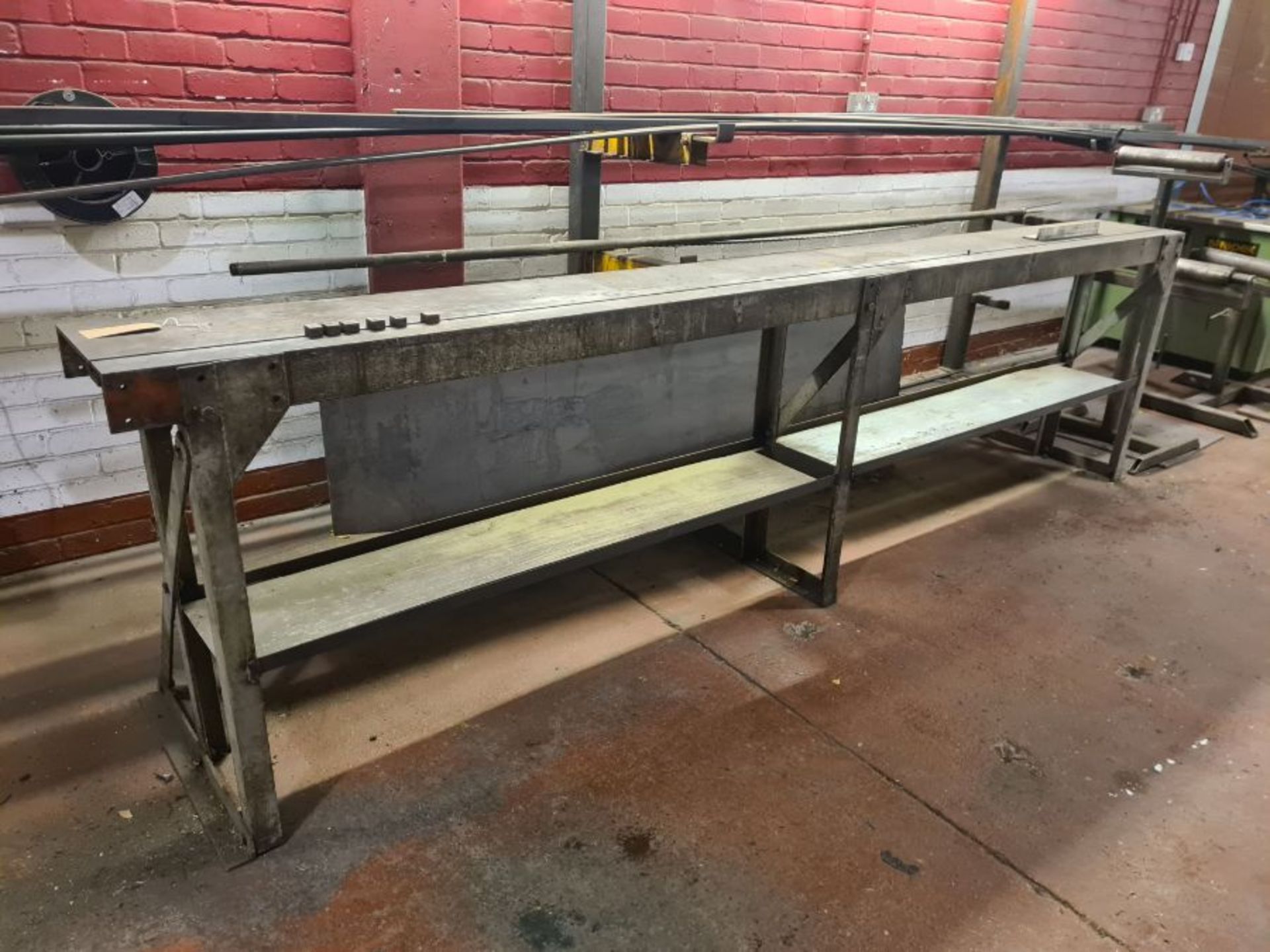 Heavy duty engineers cutting bench with slotted work surfaces and stops