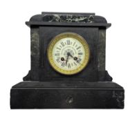 A French 19th century mantle clock in a Belgium slate case with a flat top and stepped plinth