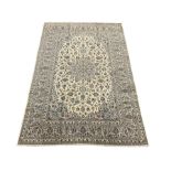 Persian ivory ground Kashan rug