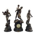 An imposing French spelter clock garniture displaying the patriotic feats of a team of French firef