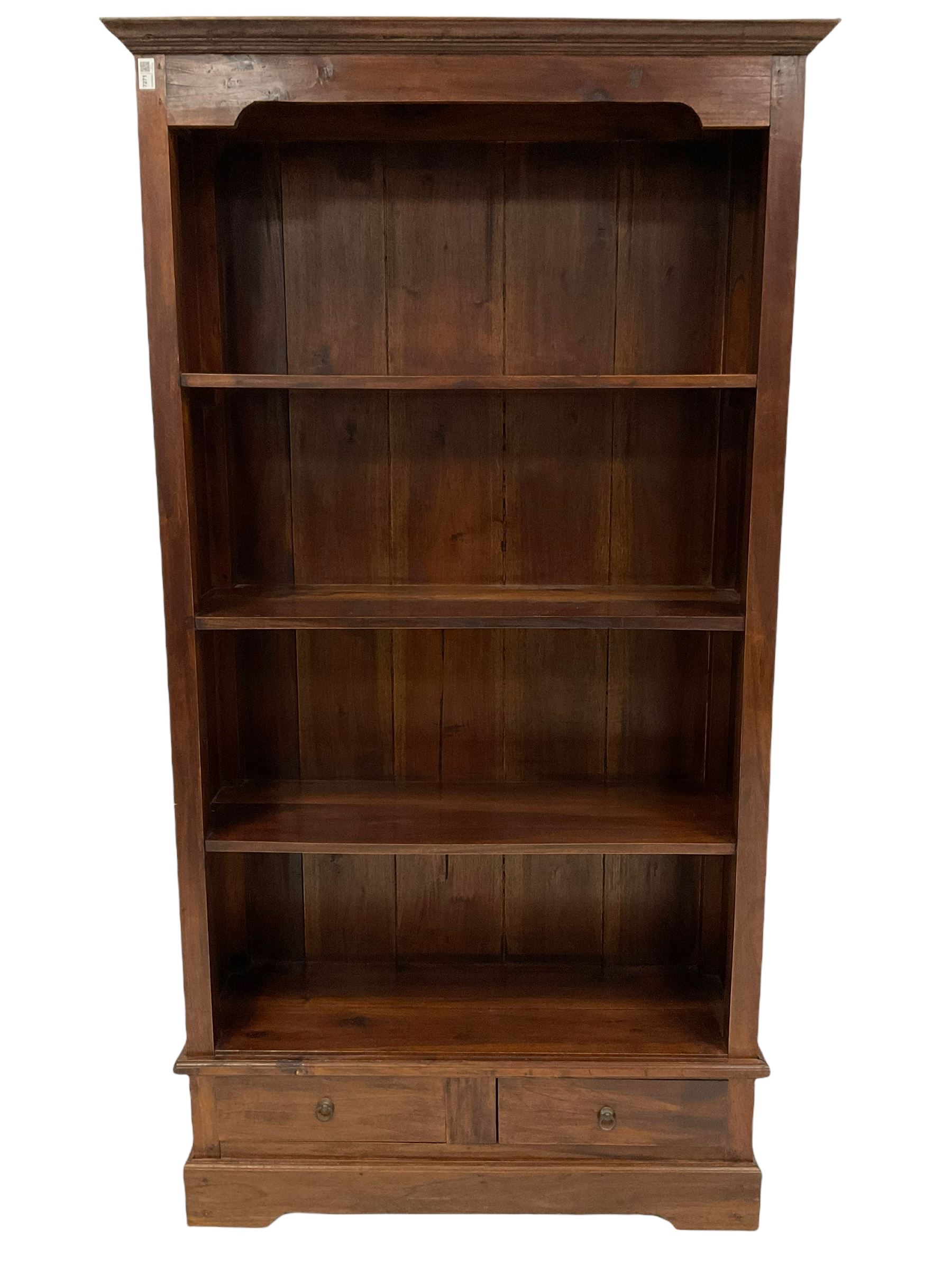 Tall stained hardwood bookcase