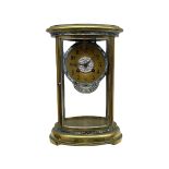 An early 20th century French oval four glass clock with cloisonne decoration