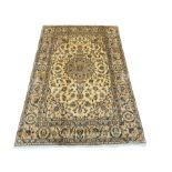 Persian Kashan golden ivory ground rug