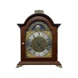 A 20th century mantle clock with a three train Hermle spring driven movement chiming the quarters an