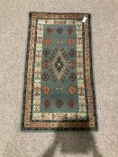 small green ground rug