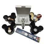 Disney wristwatches comprising four Ingersoll wristwatches in Mickey Mouse shaped tin cases