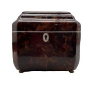 Faux tortoiseshell tea caddy of Regency style with stepped hinged cover