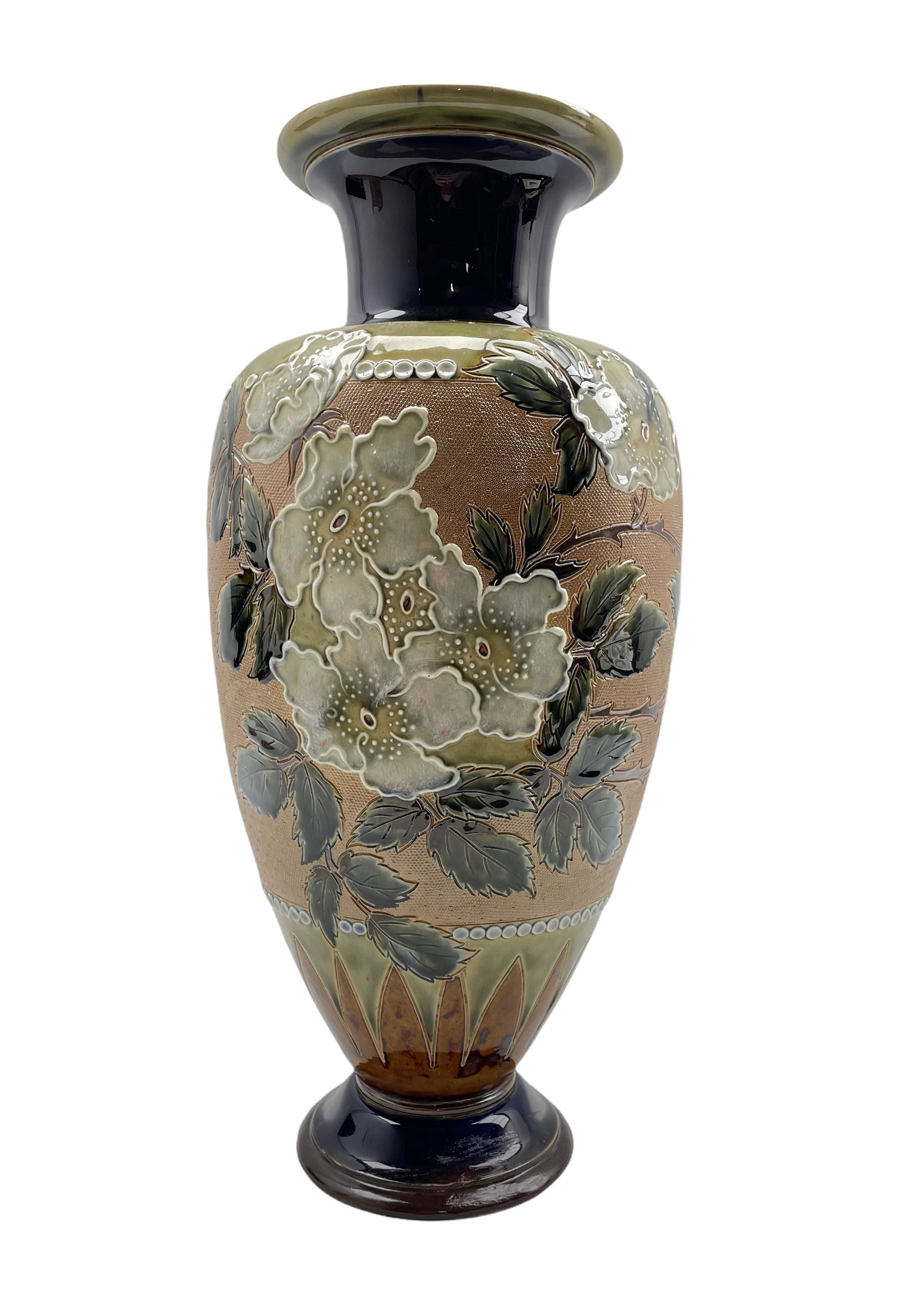 Large Doulton Slater stoneware vase applied with floral decoration on chine ground