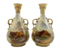 Pair of Royal Worcester porcelain twin handled vases circa 1909