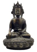 Chinese bronze buddha seated cross legged holding a censer and on a lotus base H37cm