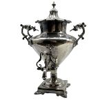 Victorian plated baluster tea urn with ceramic handles stamped 'Warranted Best London Manufacture' w
