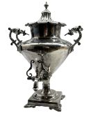 Victorian plated baluster tea urn with ceramic handles stamped 'Warranted Best London Manufacture' w