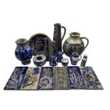 Collection of German and Continental salt glazed stoneware including two tall tapered jugs