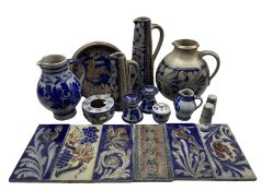 Collection of German and Continental salt glazed stoneware including two tall tapered jugs