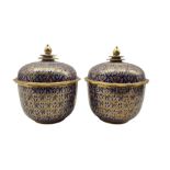 Pair of Thai Benjarong style vases and covers