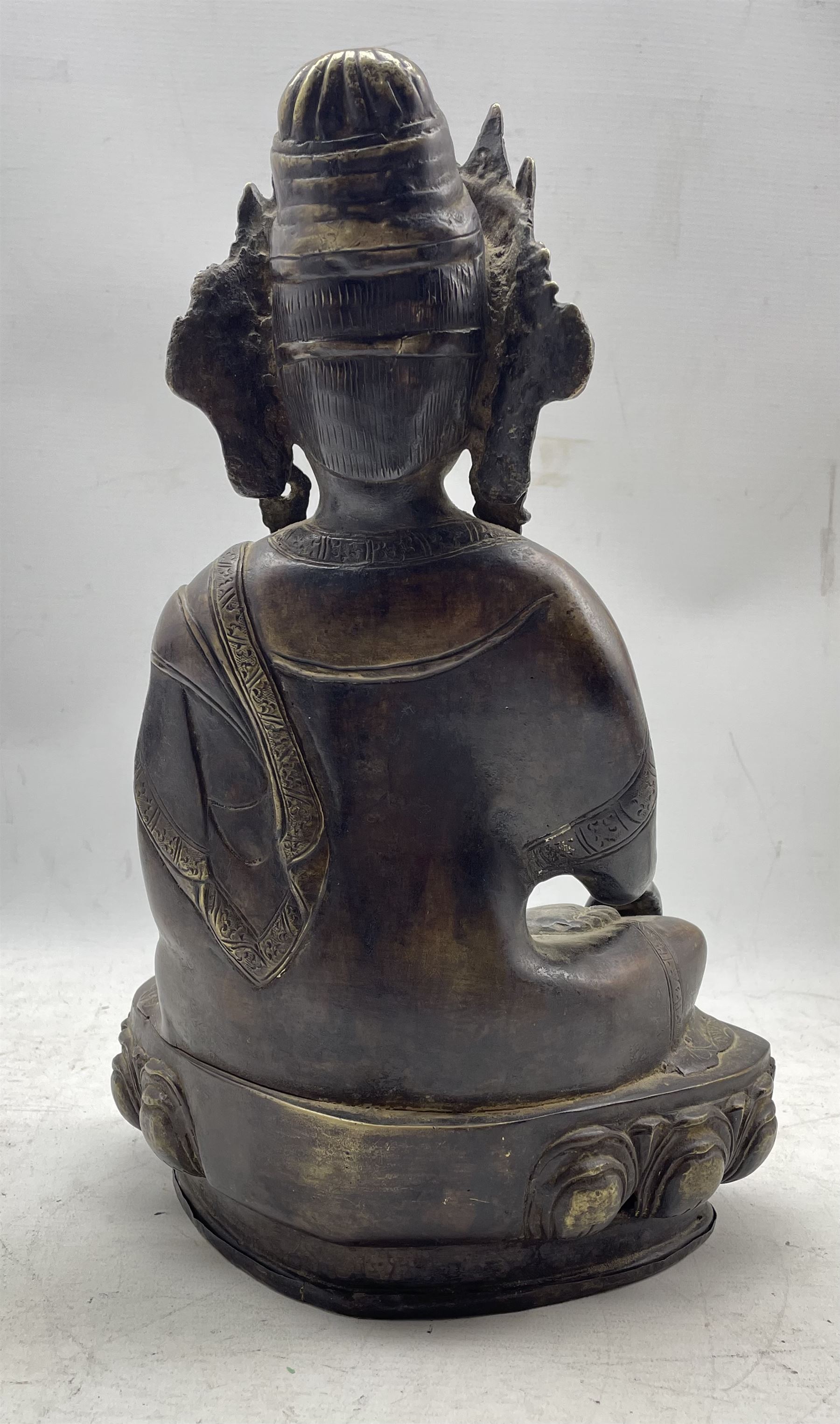 Chinese bronze buddha seated cross legged holding a censer and on a lotus base H37cm - Image 2 of 2