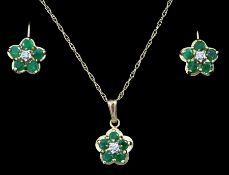 Gold emerald and diamond pendant and pair of matching stud earrings