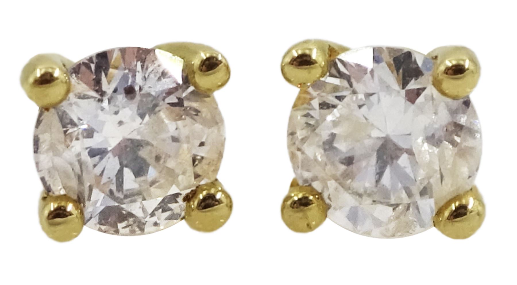 Pair of 18ct gold round brilliant cut diamond stud earrings