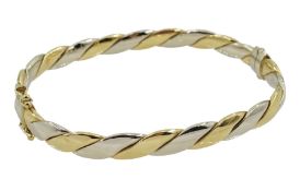 9ct white and yellow gold spring hinged bangle
