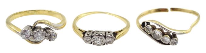Gold four stone diamond crossover ring