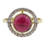 Silver-gilt cabochon garnet ring with cubic zirconia halo surround