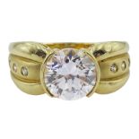 14ct gold half bezel set single stone cubic zirconia dress ring