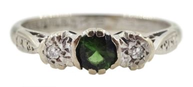 18ct white gold three stone diamond and green garnet ring