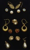 Gold pearl ring and seven pairs of gold earrings
