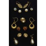 Gold pearl ring and seven pairs of gold earrings