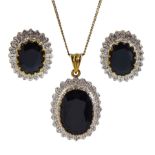 Gold sapphire and diamond chip pendant necklace with matching pair of gold stud earrings