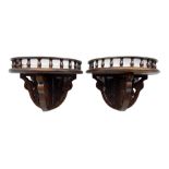 Pair of mahogany demi lune wall brackets with spindle galleries above floral pierced supports