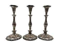 Set of three Old Sheffield plate candlesticks