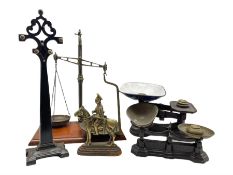 Pair of Victorian brass scales on mahogany base
