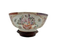 18th century Chinese Export punch bowl decorated with reserves of flowers on a textured ground