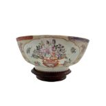 18th century Chinese Export punch bowl decorated with reserves of flowers on a textured ground