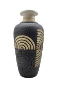 Patrick Oates (Irish 1948-): carved and incised stoneware vase with slightly flared rim