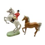 Beswick Huntsman on white painted rearing horse no.868 H25cm (a/f) together with a Beswick Palomino