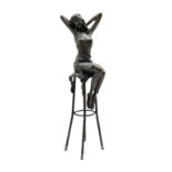 Art Deco style bronze figure of a lady with hands raised behind her head