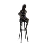 Art Deco style bronze figure of a lady with knee in her hands