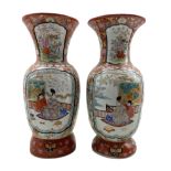 Pair of Japanese Arita porcelain vases painted with panels of bijin