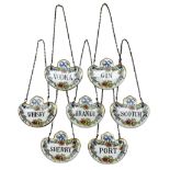 Set of seven Coalport porcelain decanter labels: Brandy