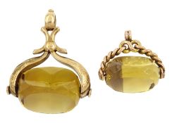 Two late 19th century/early 20th century 9ct gold citrine swivel fobs