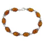 Silver oval Baltic amber bracelet