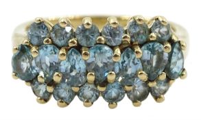 9ct gold pear and round blue topaz three row ring