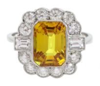 Platinum emerald cut yellow sapphire